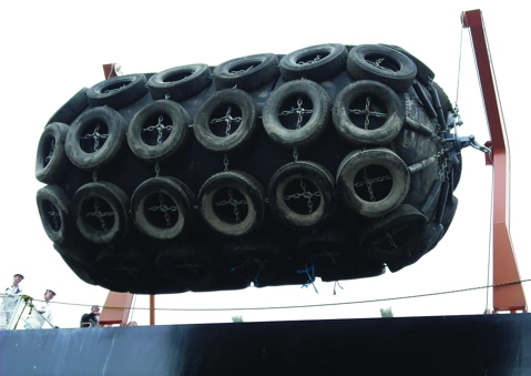 Yokohama pneumatic fenders with tyre net protection on fender davit