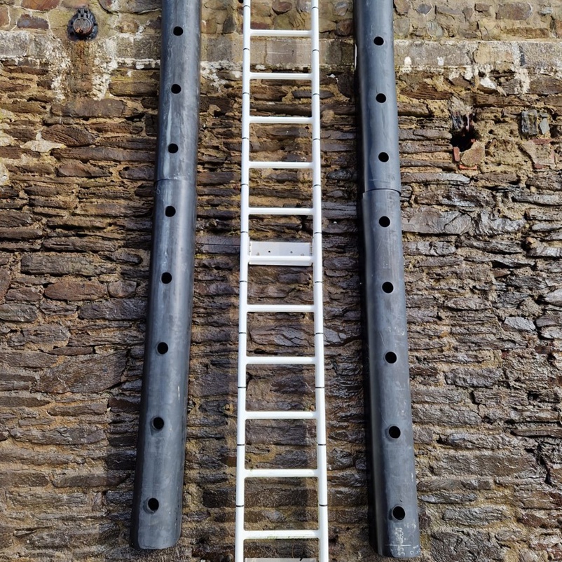 Quayside ladders on harbour wall